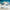 MinimalisticDecor.com-Whales Lighthouse Sky Blue White Clouds Wallpaper for Home Wall Decor